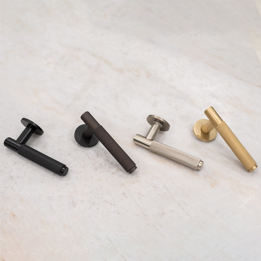 Quality image of Millhouse Brass Crompton Knurled Lever Door Handle on 5mm Slimline Round Rose - Satin Brass | Sku. mhsr100sb | available from Trade Door Handles.