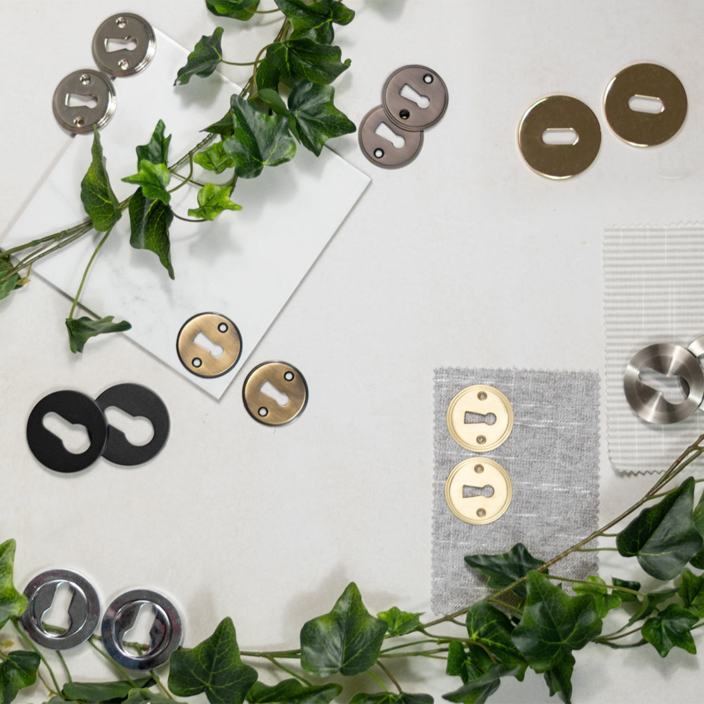 Quality image of Millhouse Brass Key Escutcheons on 5mm Slimline Round Rose - Polished Brass | Sku. mhsrkpb | available from Trade Door Handles.