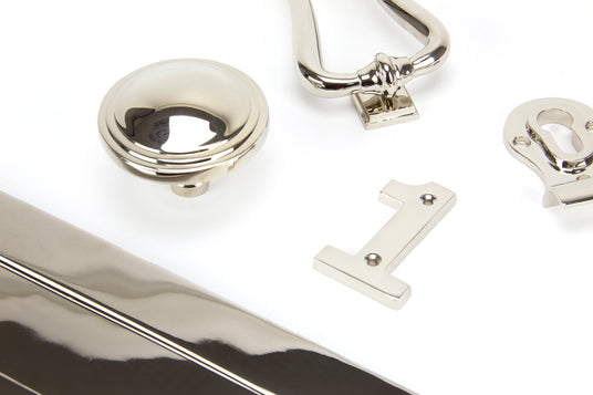 Image showing a selection of Front Door Accessories made by From the Anvil in a Polished Nickel finish