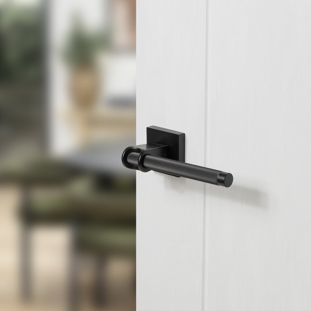 Quality image of Oro & Oro Aria Lever Door Handle on Square Rose - Matt Black | Sku. o10015emb | available from Trade Door Handles.