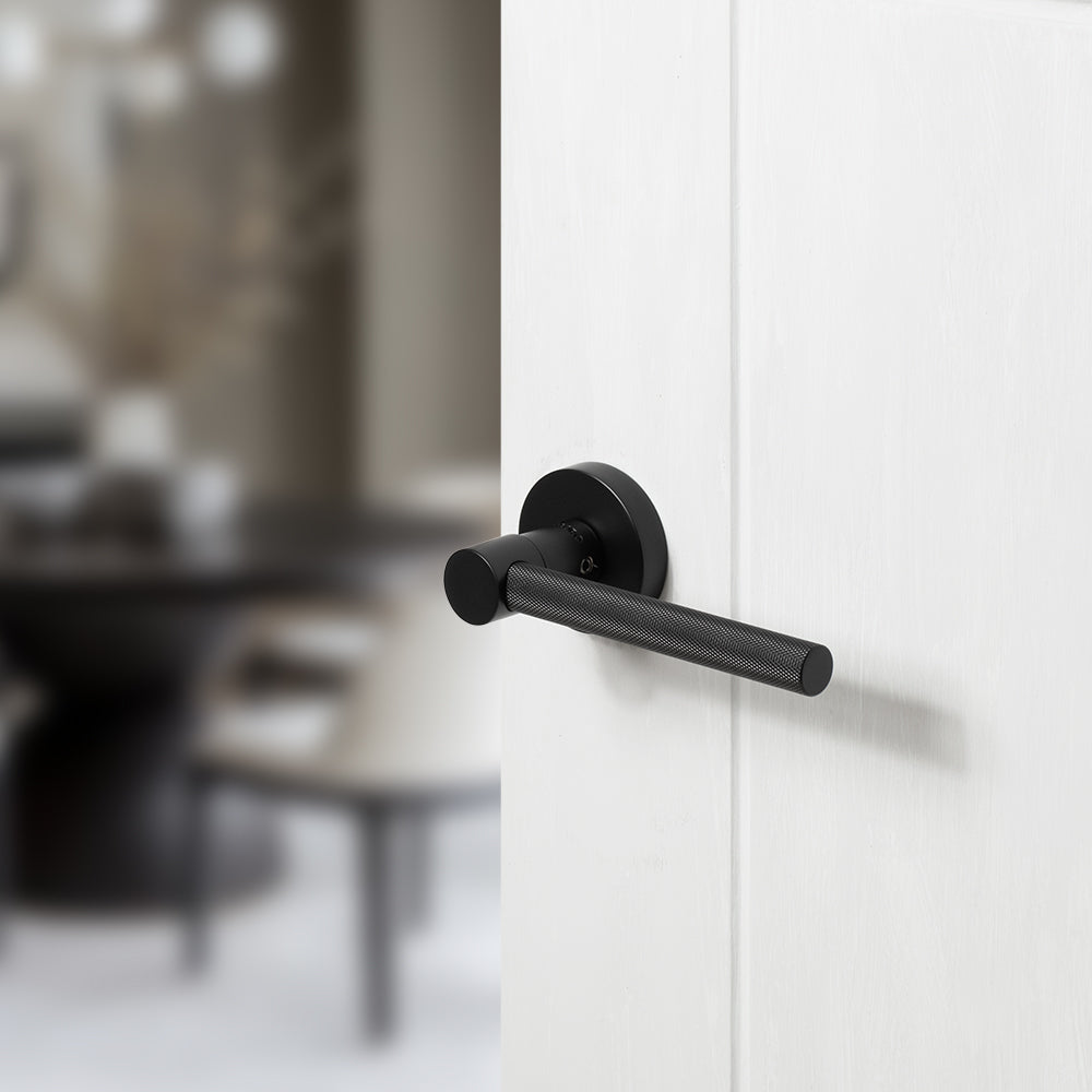 Quality image of Oro & Oro Stradi Lever Door Handle on Round Rose - Matt Black | Sku. o10917emb | available from Trade Door Handles.