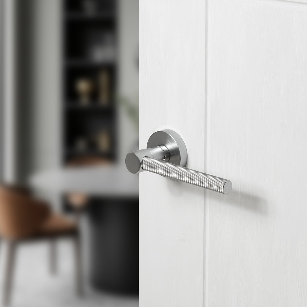 Quality image of Oro & Oro Stradi Lever Door Handle on Round Rose - Satin Chrome | Sku. o10917esc | available from Trade Door Handles.
