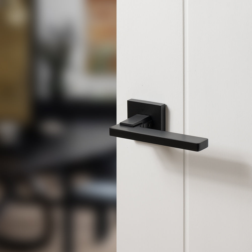 Quality image of Oro & Oro Alba Lever Door Handle on Square Rose - Matt Black | Sku. o6815emb | available from Trade Door Handles.