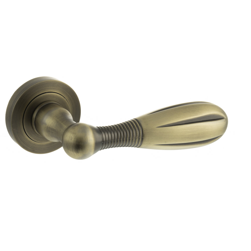 Quality image of Old English Cambridge Lever Door Handle on Round Rose - Matt Antique Brass | Sku. oe175mab | available from Trade Door Handles.