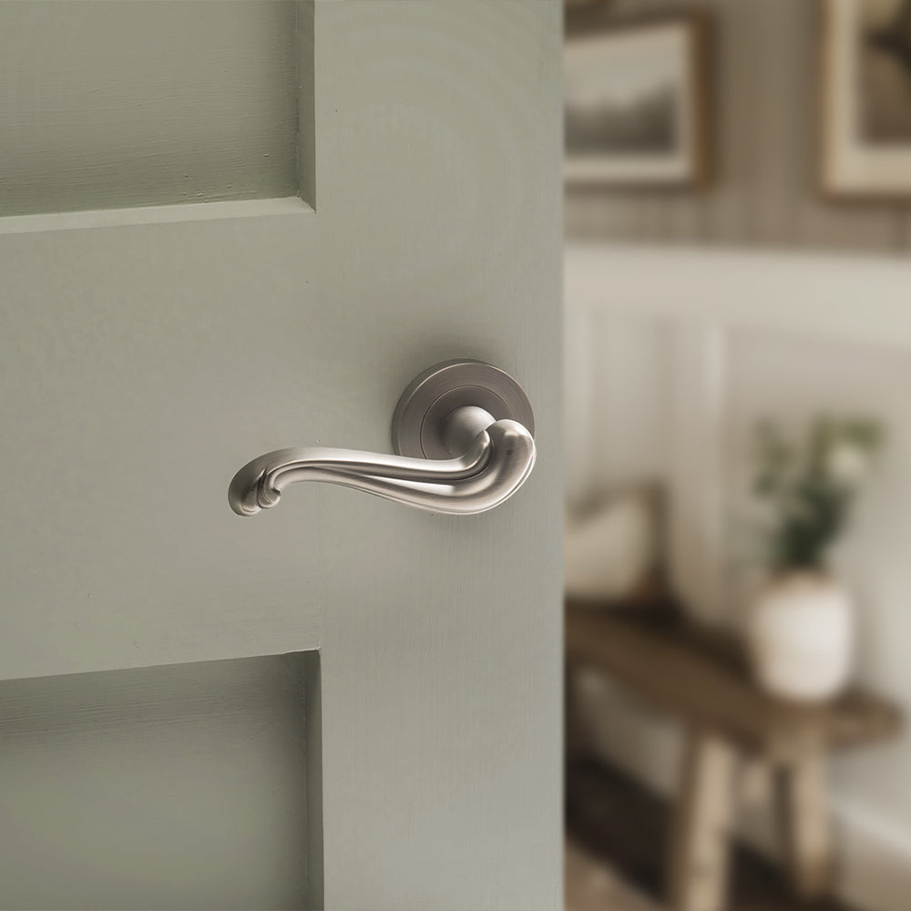 Quality image of Old English Colchester Lever Door Handle on Round Rose - Matt Gun Metal | Sku. oe177mbn | available from Trade Door Handles.