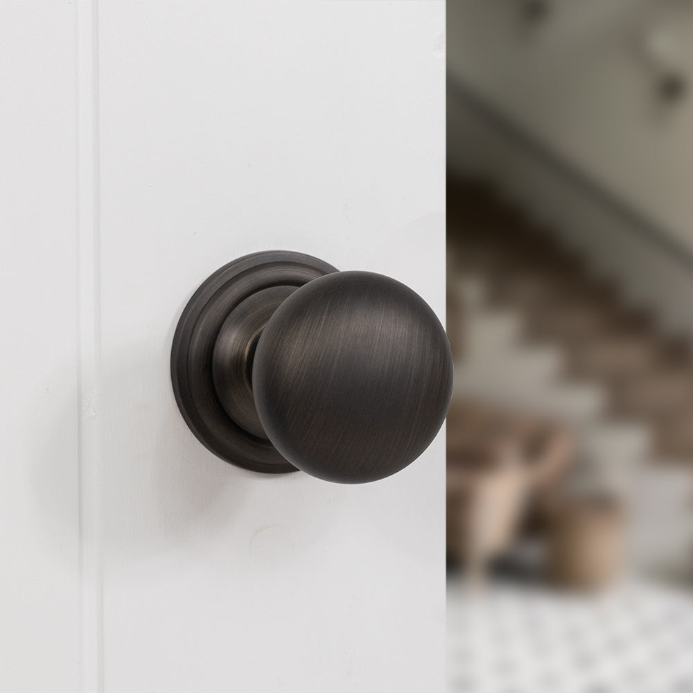 Quality image of Old English Harrogate Solid Brass Mushroom Mortice Knob on Concealed Fix Rose - Urban Bronze | Sku. oe58mmkub | available from Trade Door Handles.
