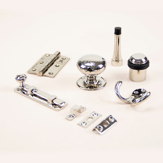 This image shows a range of ironmongery in a Polished Nickel finish made by From The Anvil, available to order from Trade Door Handles in Kendal