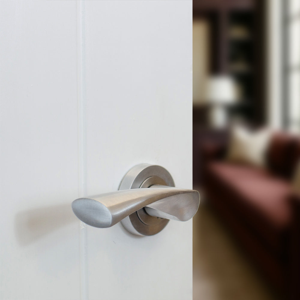 Quality image of STATUS Colorado Lever Door Handle on Round Rose - Satin Chrome | Sku. s34rsc | available from Trade Door Handles.
