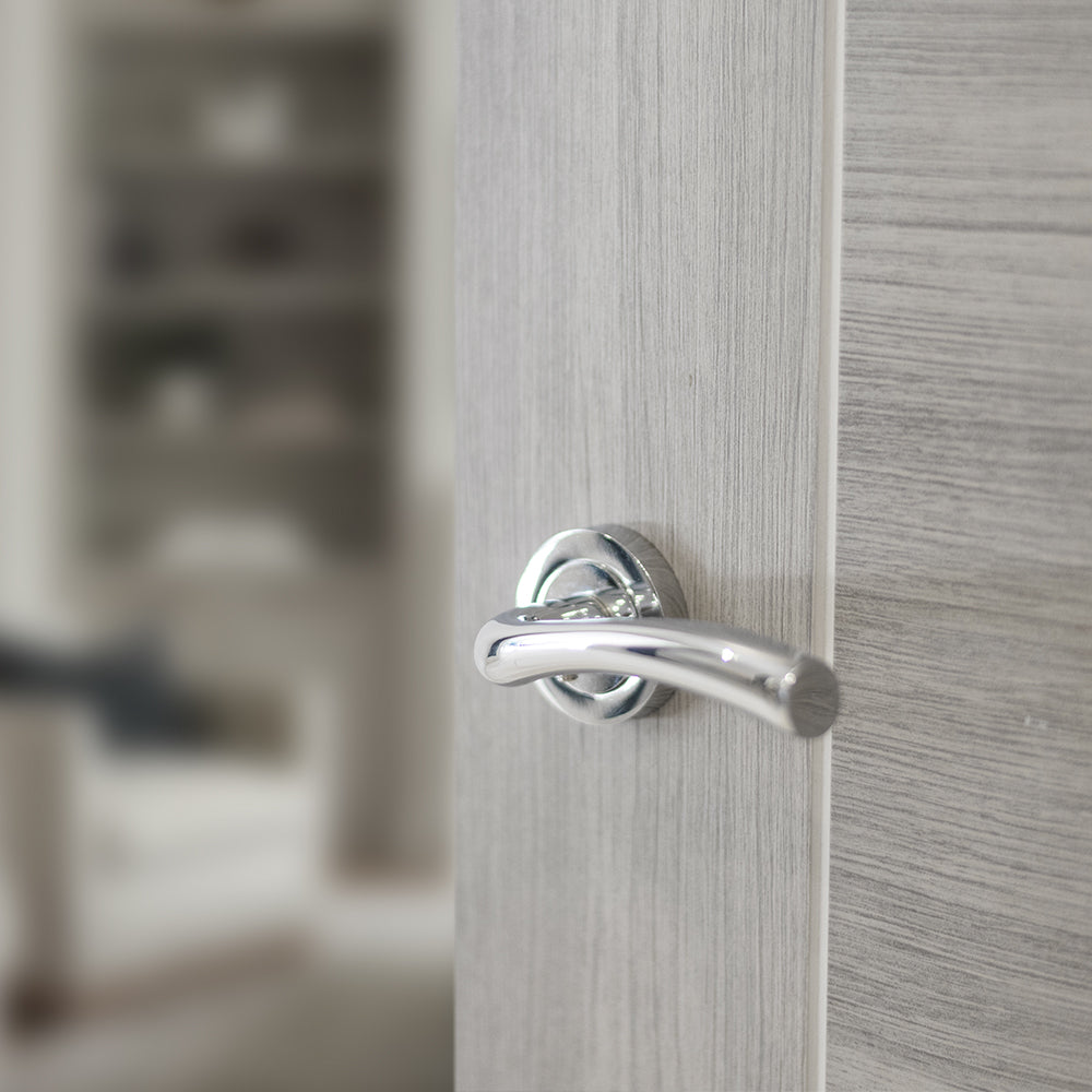 Quality image of STATUS Texas Lever Door Handle on Round Rose - Polished Chrome | Sku. s35rpc | available from Trade Door Handles.