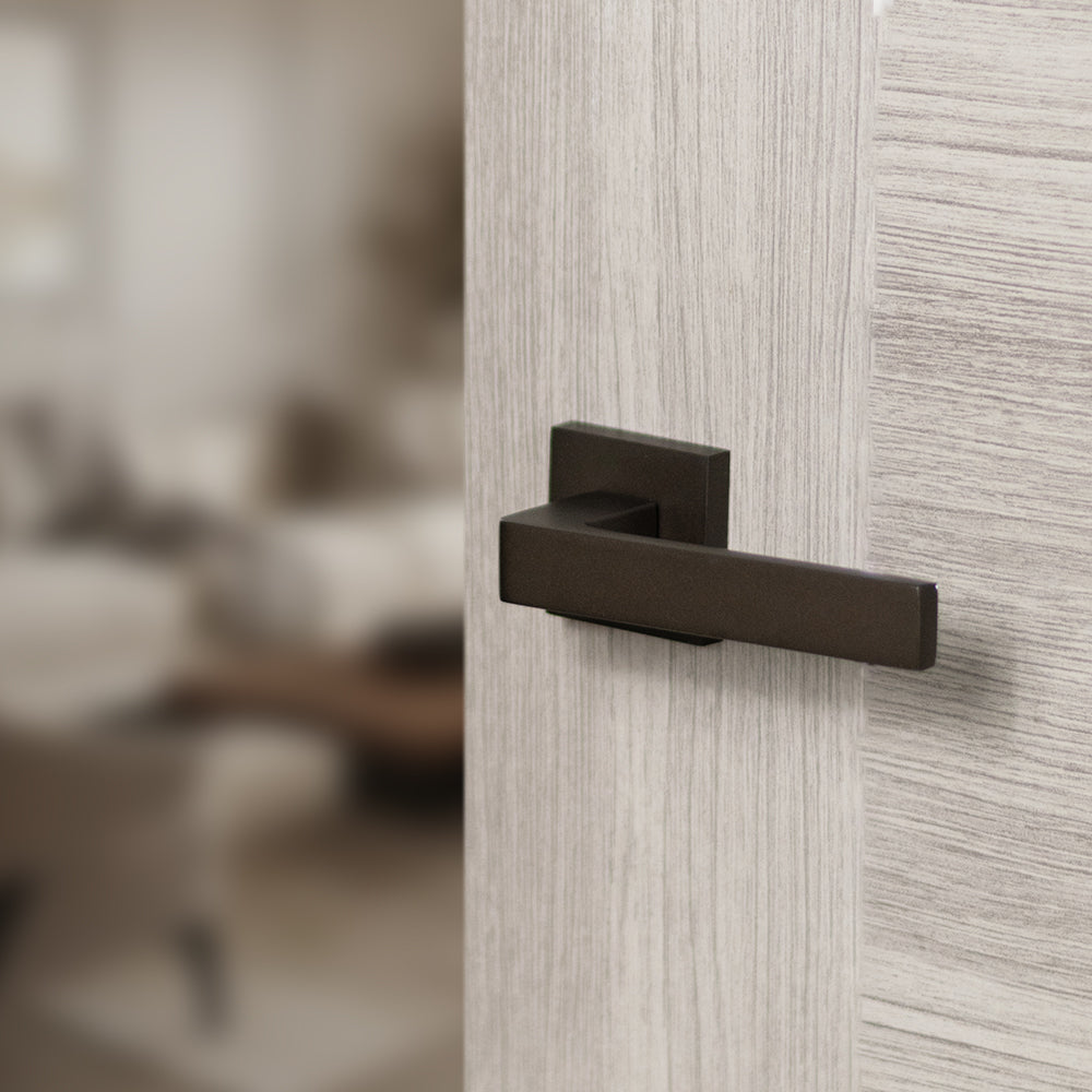 Quality image of STATUS Montana Lever Door Handle on S4 Square Rose - Urban Dark Bronze | Sku. s40sudb | available from Trade Door Handles.