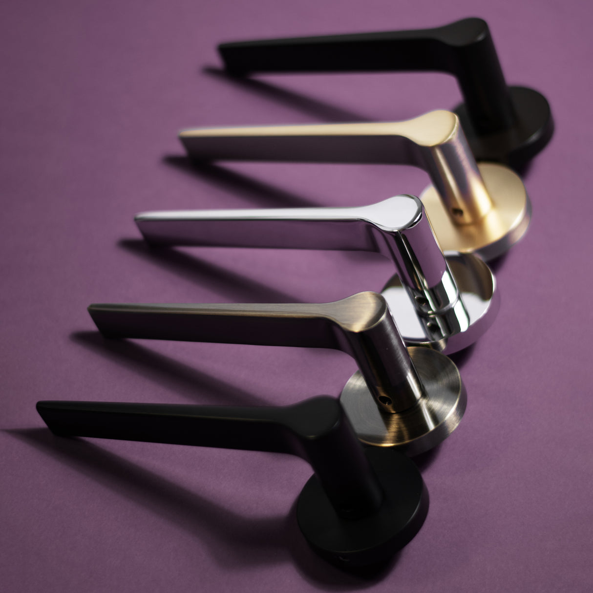 Quality image of Senza Pari Laviano Lever Door Handle on Minimal Round Rose - Antique Brass | Sku. spr180ab | available from Trade Door Handles.