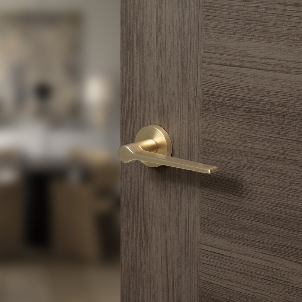 Quality image of Senza Pari Laviano Lever Door Handle on Minimal Round Rose - Satin Brass | Sku. spr180sb | available from Trade Door Handles.