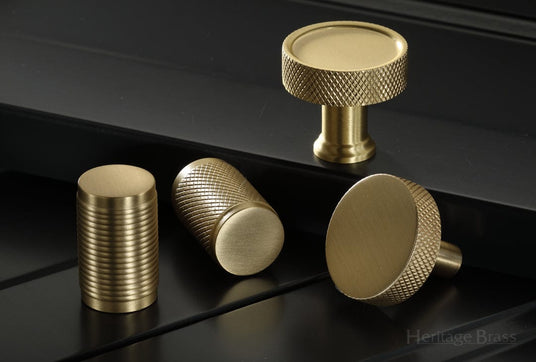 This image shows a range of cabinet knobs by Heritage Brass in a Satin Brass finish. Available to order from Trade Door Handles in Kendal