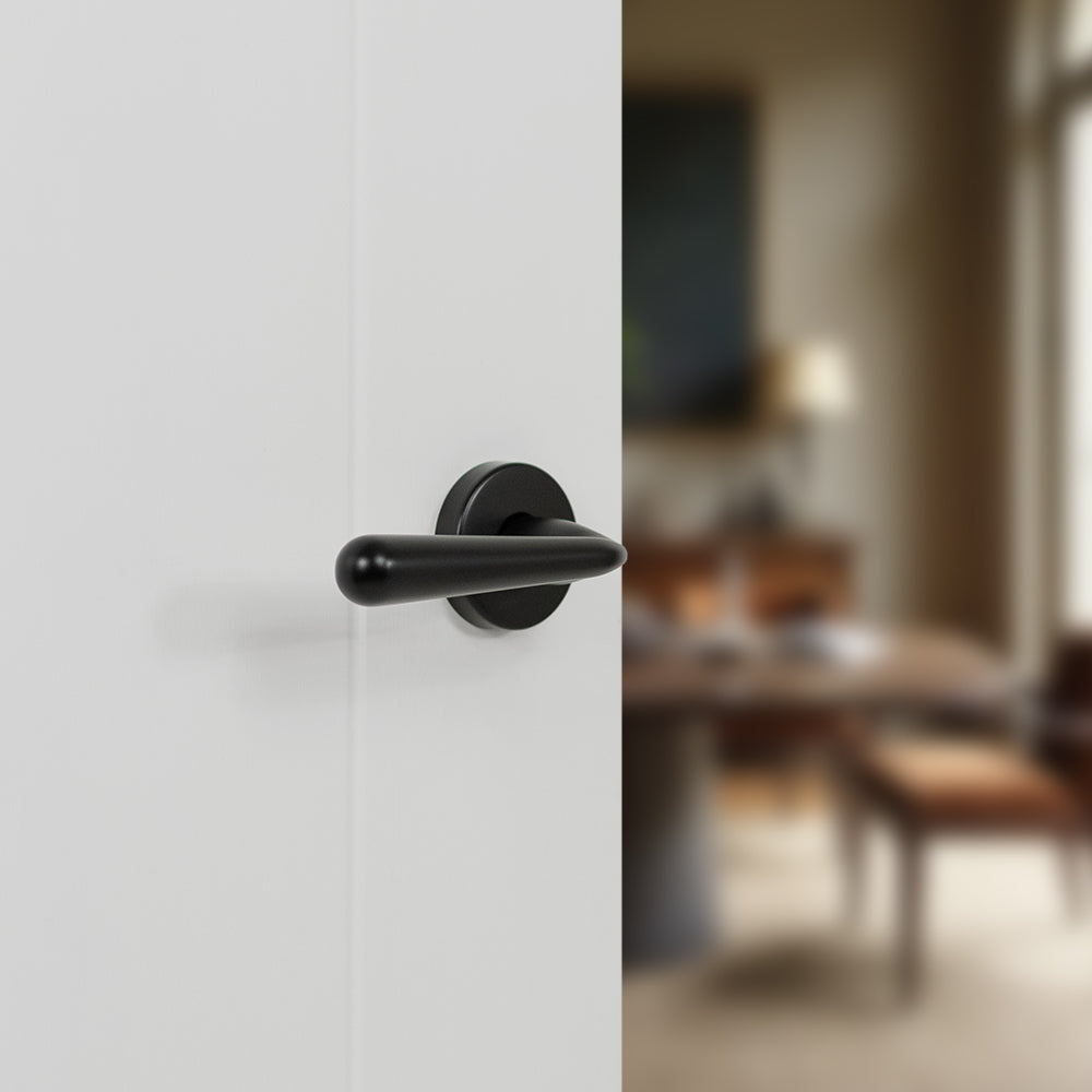 Quality image of Tupai Rapido CurvaLine Adra Lever Door Handle on Round Rose - Pearl Black | Sku. t293rmb | available from Trade Door Handles.