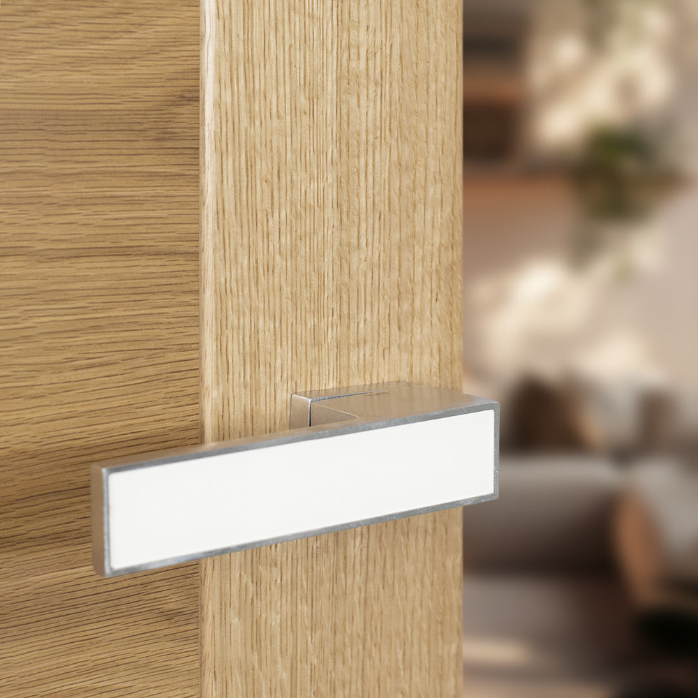 Quality image of Tupai Rapido VersaLine Tobar Lever Door Handle on Long Rose - White Decorative Plate - Satin Chrome | Sku. t3089lwhsc | available from Trade Door Handles.