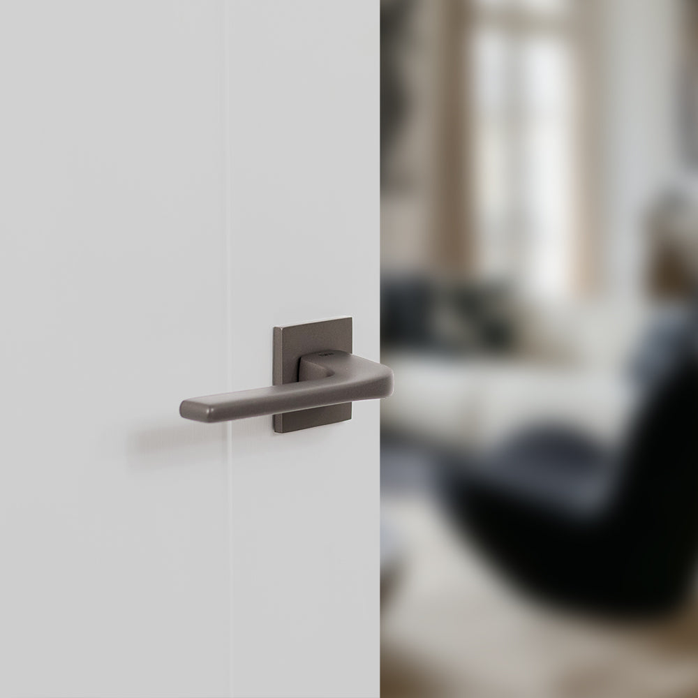 Quality image of Tupai Rapido 5S Line Canha Lever Door Handle on 5mm Slimline Square Rose - Titanium | Sku. t4007s5stt | available from Trade Door Handles.