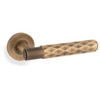 Alexander & Wilks Door Furniture Antique Brass / Door Handles on Rose Alexander & Wilks - SPITFIRE LEVER DIAMOND CUT ON 50X6MM ROSE - Antique Brass