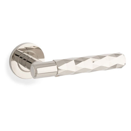 This is an image showing Alexander & Wilks Spitfire Diamond Cut Lever on Round Rose - Polished Nickel PVD - aw226-PNPVD available to order from Trade Door Handles in Kendal, quick delivery and discounted prices.