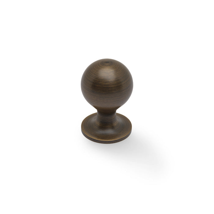 High quality image of Alexander & Wilks Plain Caesar Cabinet Knob-Antique Brass-25mm | Sku. AW844-25-AB | Trade Door Handles.