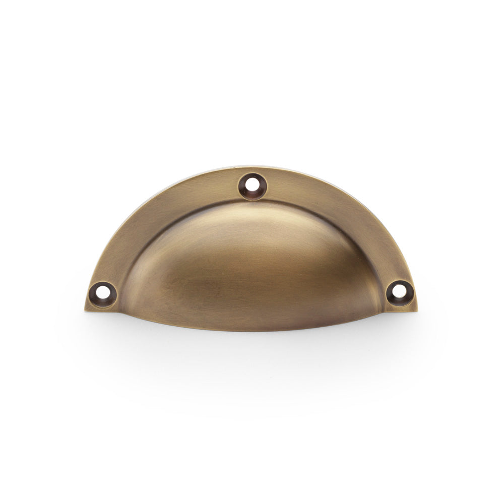 High quality image of Alexander & Wilks Raoul Cup Handle - Antique Brass | Sku. aw910ab | Trade Door Handles.