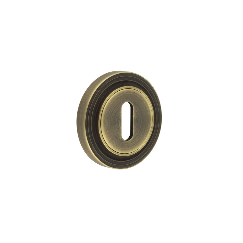High quality image of Burlington - Standard Keyway Escutcheons Reeded Rose Antique Brass Sku. BUR-60AB-74AB