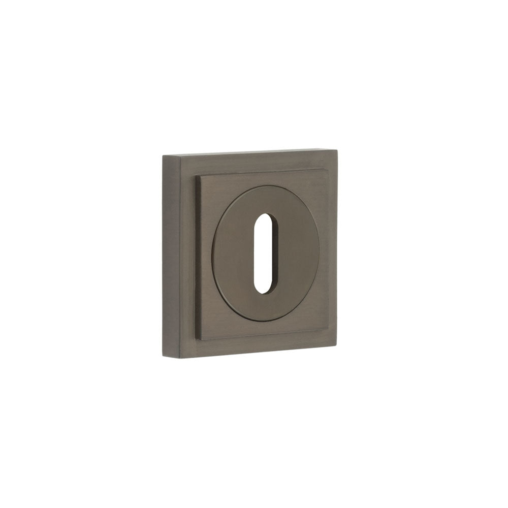 High quality image of Burlington - Standard Keyway Escutcheons Square Stepped Rose Dark Bronze Sku. BUR-60DB-173DB