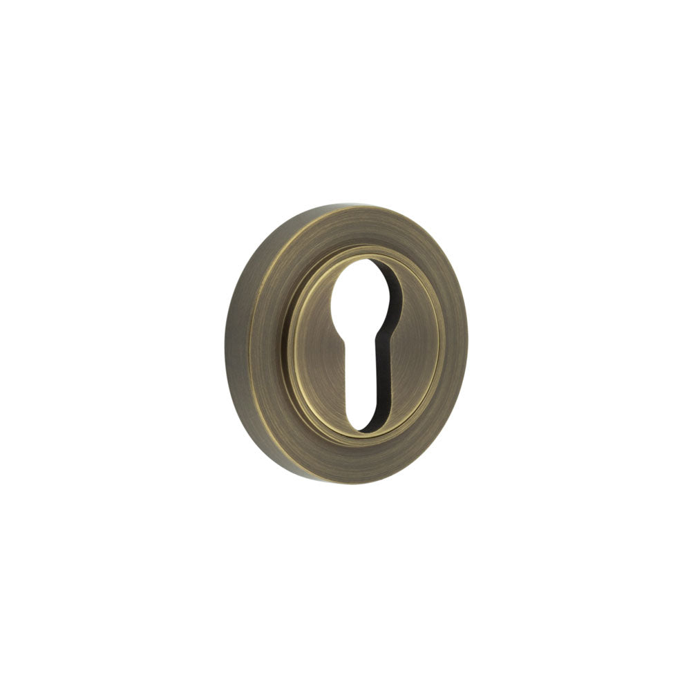 High quality image of Burlington - Euro Profile Escutcheons Plain Rose Antique Brass Sku. BUR-61AB-71AB