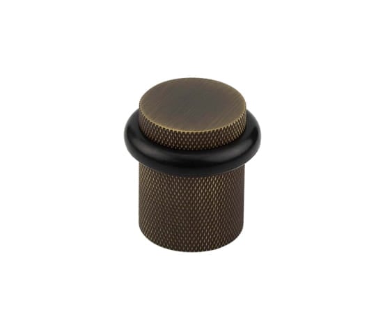 High quality image of Burlington - Knurled Floor Mounted Doorstops 40mm Dia Antique Brass Sku. BUR964AB