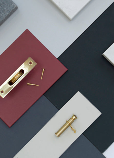 Image showing a selection of From The Anvil Lacquered Brass products.  Available to order from Trade Door Handles in Kendal