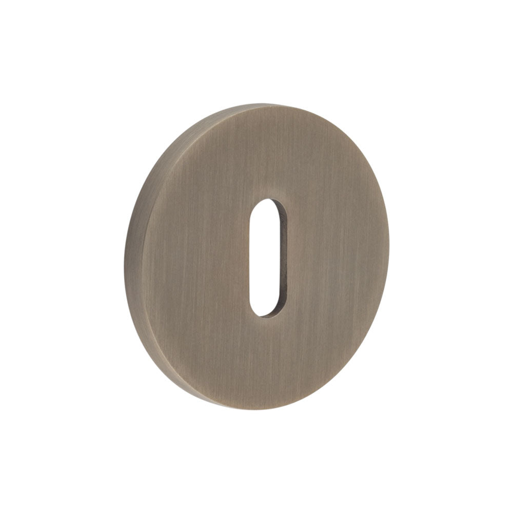 High quality image of CRES - CR-R10 Antique Brass Standard Keyway Round Rose Escutcheon Sku. CR-R10AB