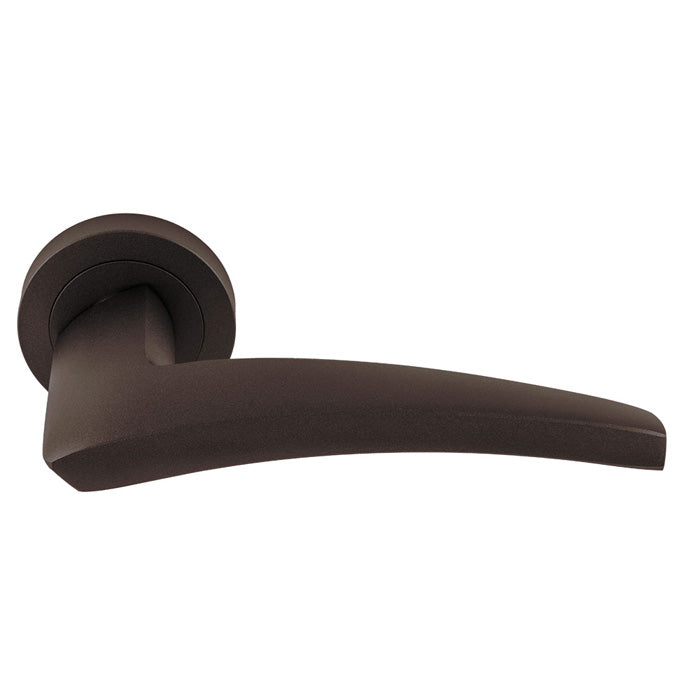High quality image of Manital - Dune lever on Round Rose - Matt Bronze | Sku. du5mbrz | Trade Door Handles.