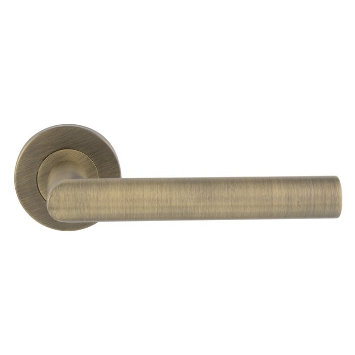 Eurospec Door Furniture Antique Brass / Round Rose Eurospec - Mitred Round Bar Lever on Sprung Rose - Antique Brass