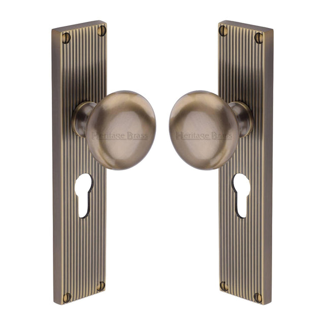 Heritage Brass Door Furniture Antique Brass / Mortice Knobs Heritage Brass Mortice Knob on Reeded Euro Profile Plate Victoria Design Antique Brass finish