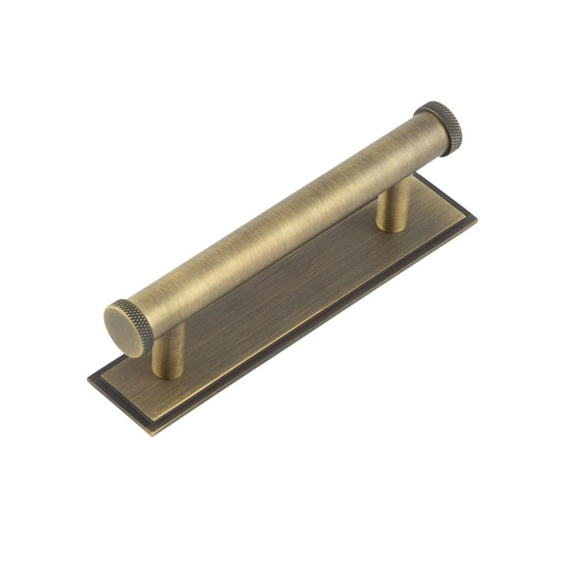 High quality image of Hoxton - Wenlock Cabinet Handles 96mm Ctrs Stepped Backplate Antique Brass Sku. HOX-150AB-6050AB