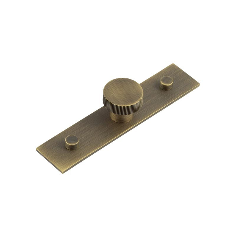 High quality image of Hoxton - Thaxted Cupboard Knobs 30mm Plain Backplate Antique Brass Sku. HOX-230AB-5090AB