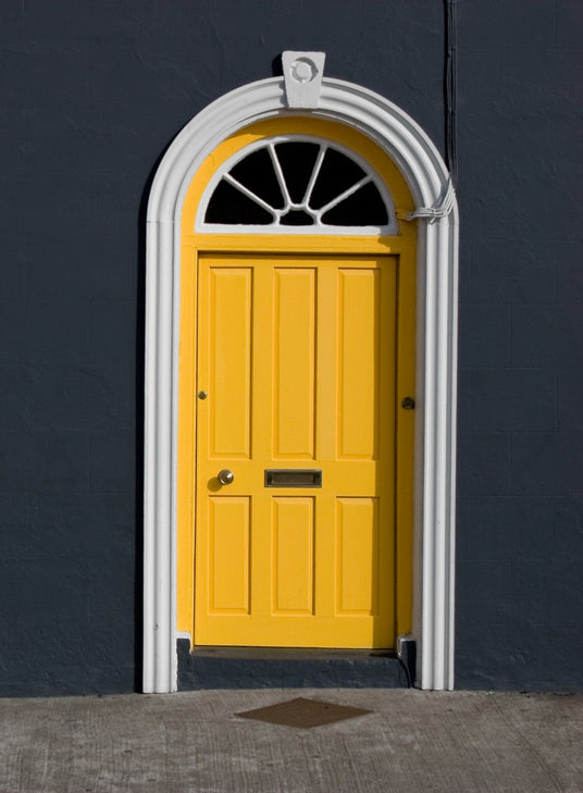 Yellow door with fanlight