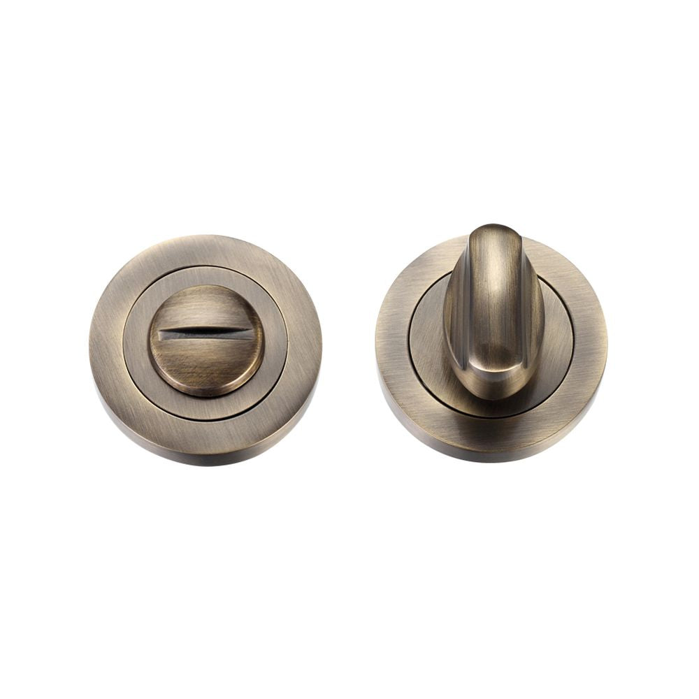 High quality image of the STANZA - Turn and Release complete with Escutcheons and 5mm spindle 50mm dia - Bronze | Sku. zpz004fb | available to order from Trade Door Handles.