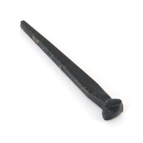 This is an image showing From The Anvil - Black Oxide 2 1/2" Rosehead Nail (1kg) available from trade door handles, quick delivery and discounted prices