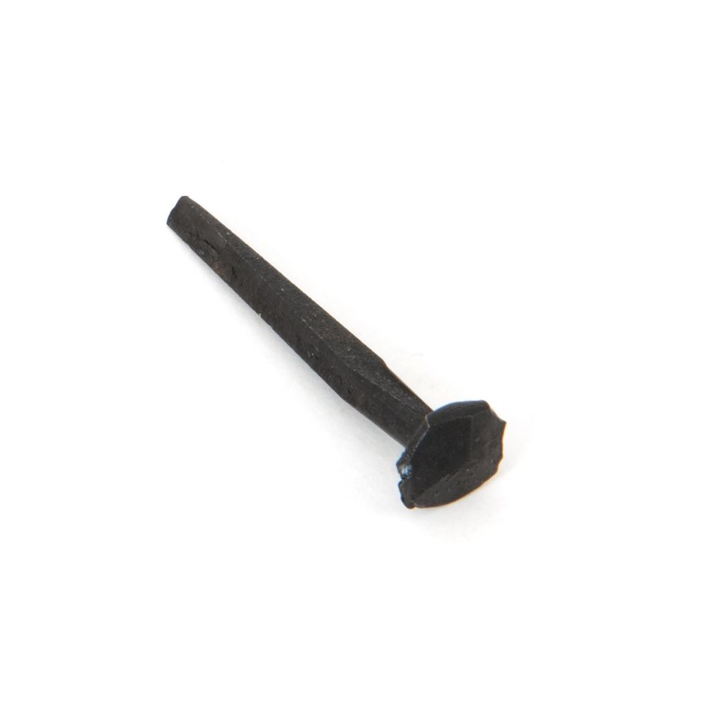 This is an image showing From The Anvil - Black Oxide 1 1/2" Rosehead Nail (1kg) available from trade door handles, quick delivery and discounted prices