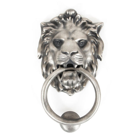 This is an image showing From The Anvil - Antique Pewter Lion Head Door Knocker available from trade door handles, quick delivery and discounted prices