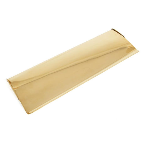 This is an image showing From The Anvil - Polished Brass Large Letter Plate Cover available from trade door handles, quick delivery and discounted prices