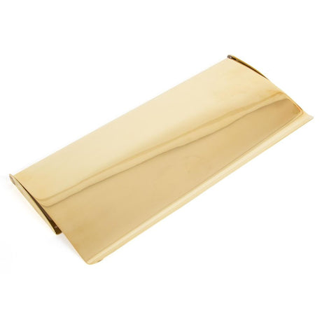 This is an image showing From The Anvil - Polished Brass Small Letter Plate Cover available from trade door handles, quick delivery and discounted prices