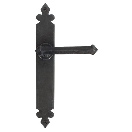 This is an image showing From The Anvil - Beeswax Tudor Lever Latch Set available from trade door handles, quick delivery and discounted prices