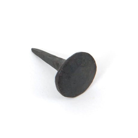 This is an image showing From The Anvil - Beeswax 1" Handmade Nail (16mm HD DIA) available from trade door handles, quick delivery and discounted prices
