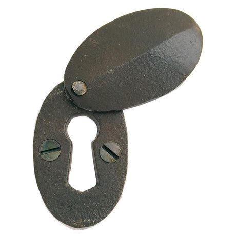 This is an image showing From The Anvil - Beeswax Oval Escutcheon & Cover available from trade door handles, quick delivery and discounted prices