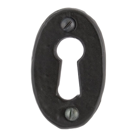 This is an image showing From The Anvil - Black Oval Escutcheon available from trade door handles, quick delivery and discounted prices