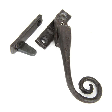 This is an image showing From The Anvil - Beeswax RH Locking Night-vent Monkeytail Fastener available from trade door handles, quick delivery and discounted prices