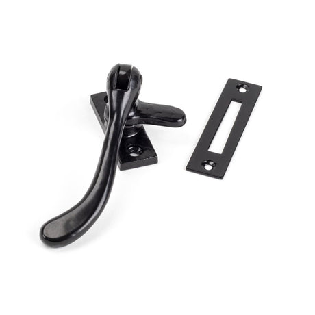This is an image showing From The Anvil - Black Handmade Peardrop Fastener available from trade door handles, quick delivery and discounted prices