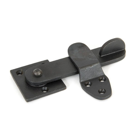 This is an image showing From The Anvil - Beeswax Privacy Latch Set available from trade door handles, quick delivery and discounted prices