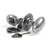 This is an image showing From The Anvil - Pewter Oval Mortice/Rim Knob Set available from trade door handles, quick delivery and discounted prices